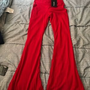 Prettylittlething red flare bottom pants